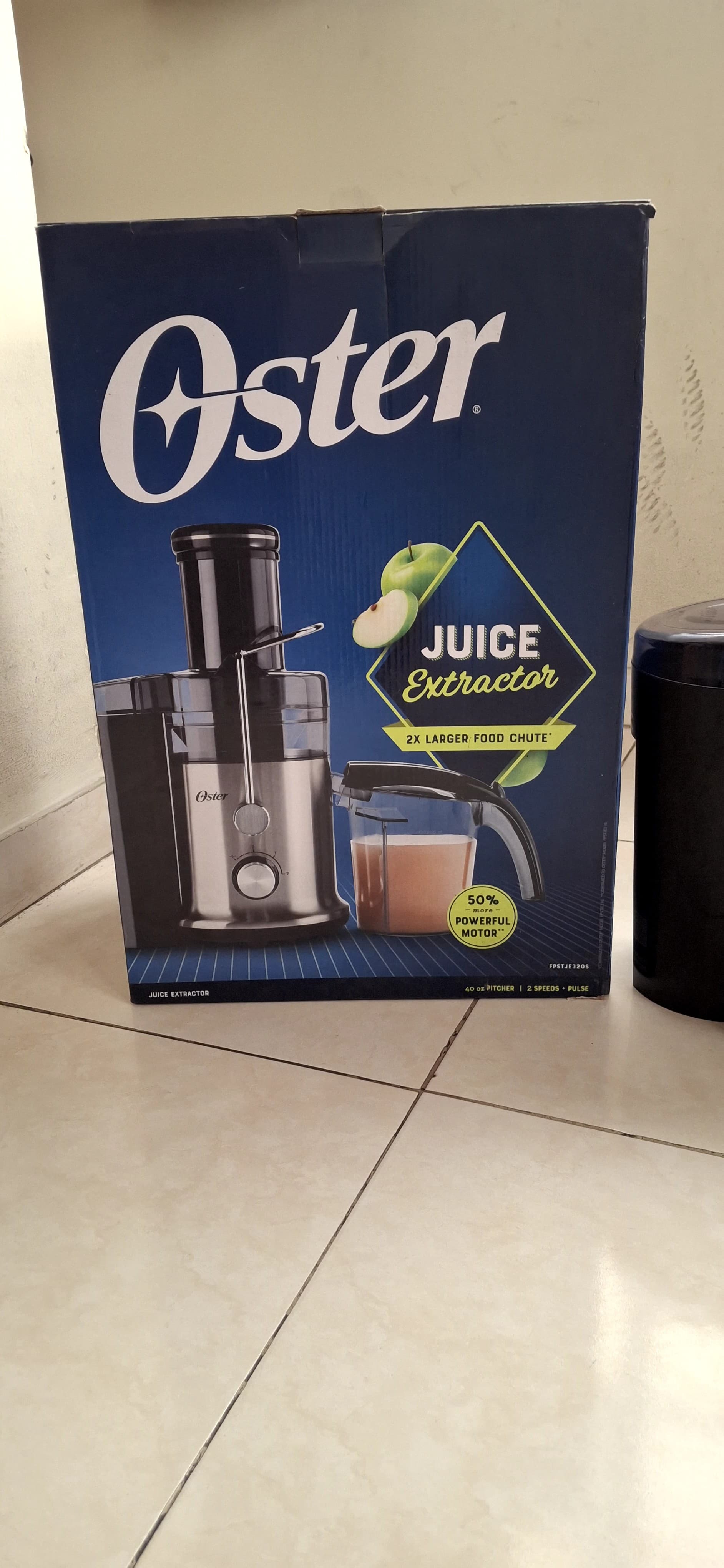 imagen de producto Extractor de jugos oster